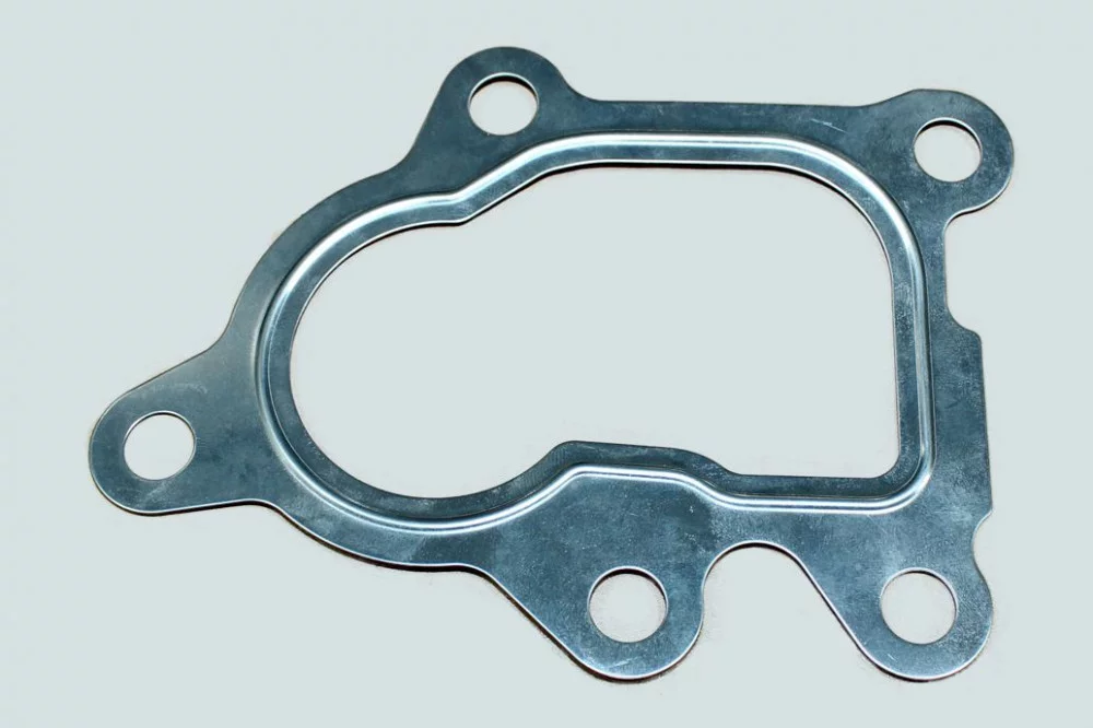 фото прокладка патрубка выпускной системы (5 отверстий) isf2.8 5255538 